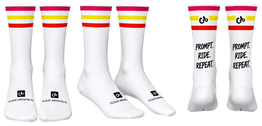 White Cloud Architects socks from the front, the side and the back, with pink, yellow and red stripes on the cuff and "Prompt. Ride. Repeat." on the calf